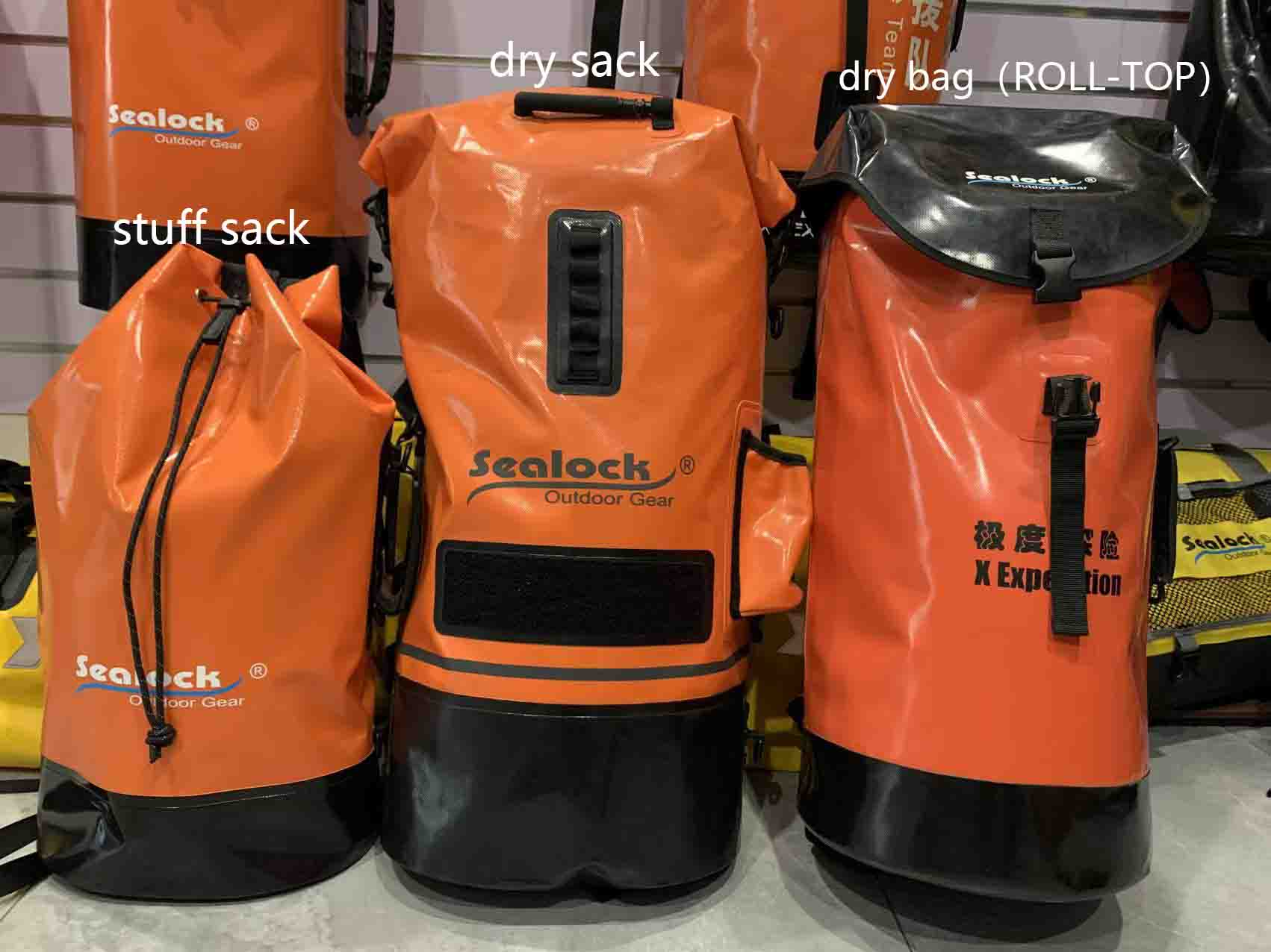 A drawstring stuff sack, a dry sack and a roll-top dry bag placed side by side for comparison